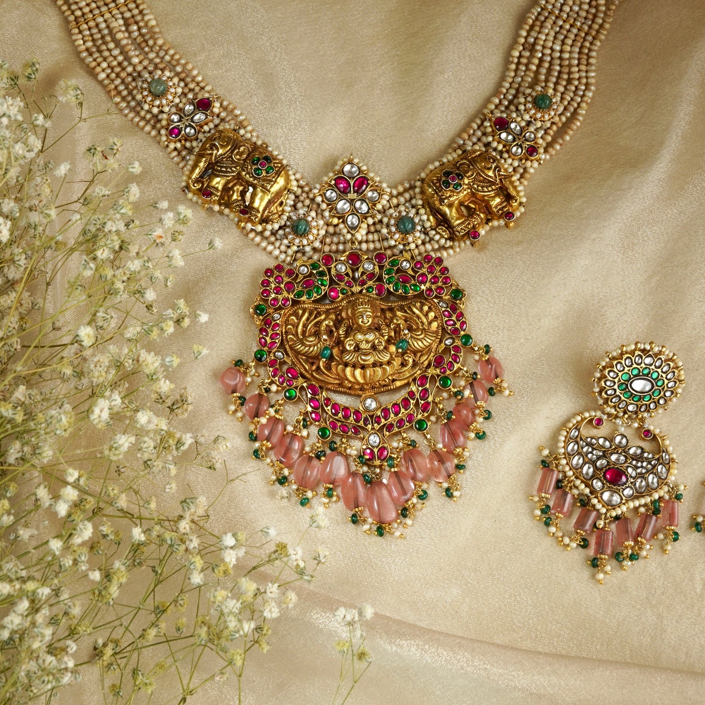 Laxmiji Pendant with Gaj fastened on precious fresh-water pearls