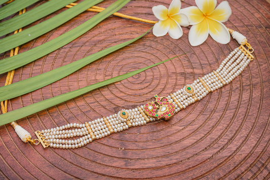 JADAU ON SILVER, PEACOCK MOTIF STRUNG IN PEARLS