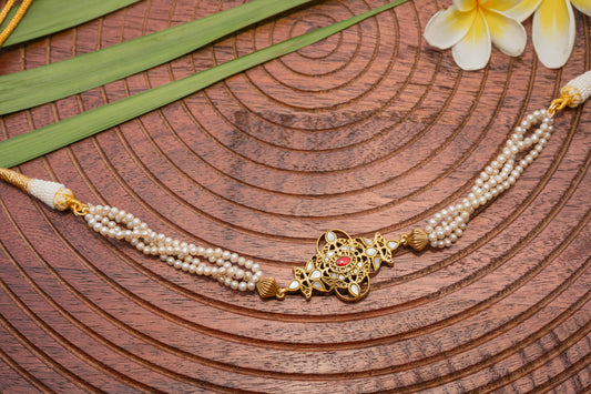 MOTHER OF PEARL, GOLD PLATED SILVER CENTRE , STRUNG IN PEARLS