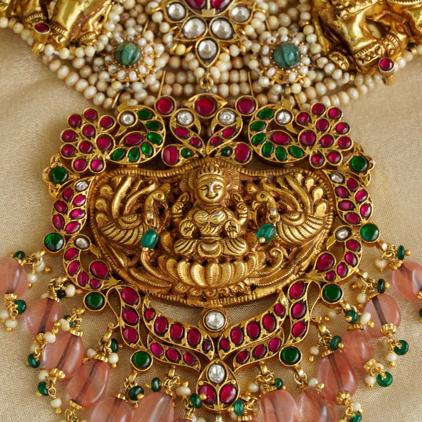 Laxmiji Pendant with Gaj fastened on precious fresh-water pearls