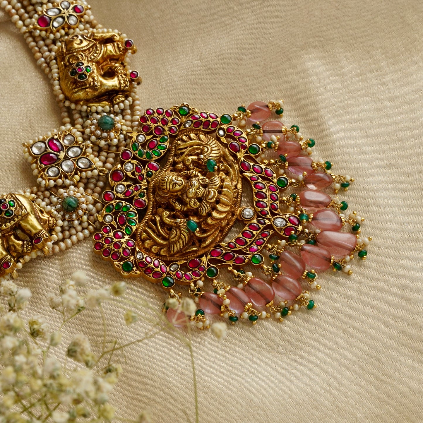 Laxmiji Pendant with Gaj fastened on precious fresh-water pearls