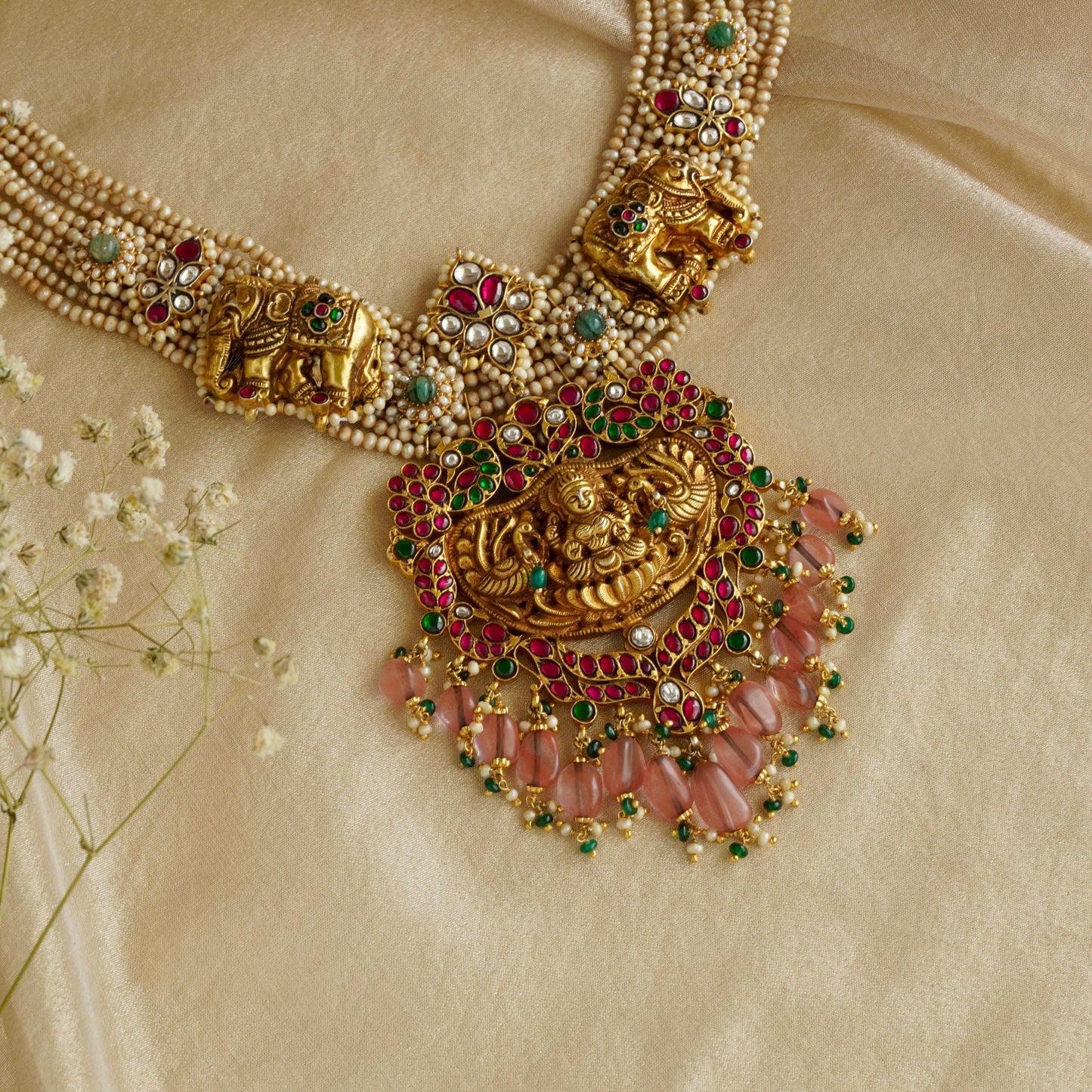 Laxmiji Pendant with Gaj fastened on precious fresh-water pearls