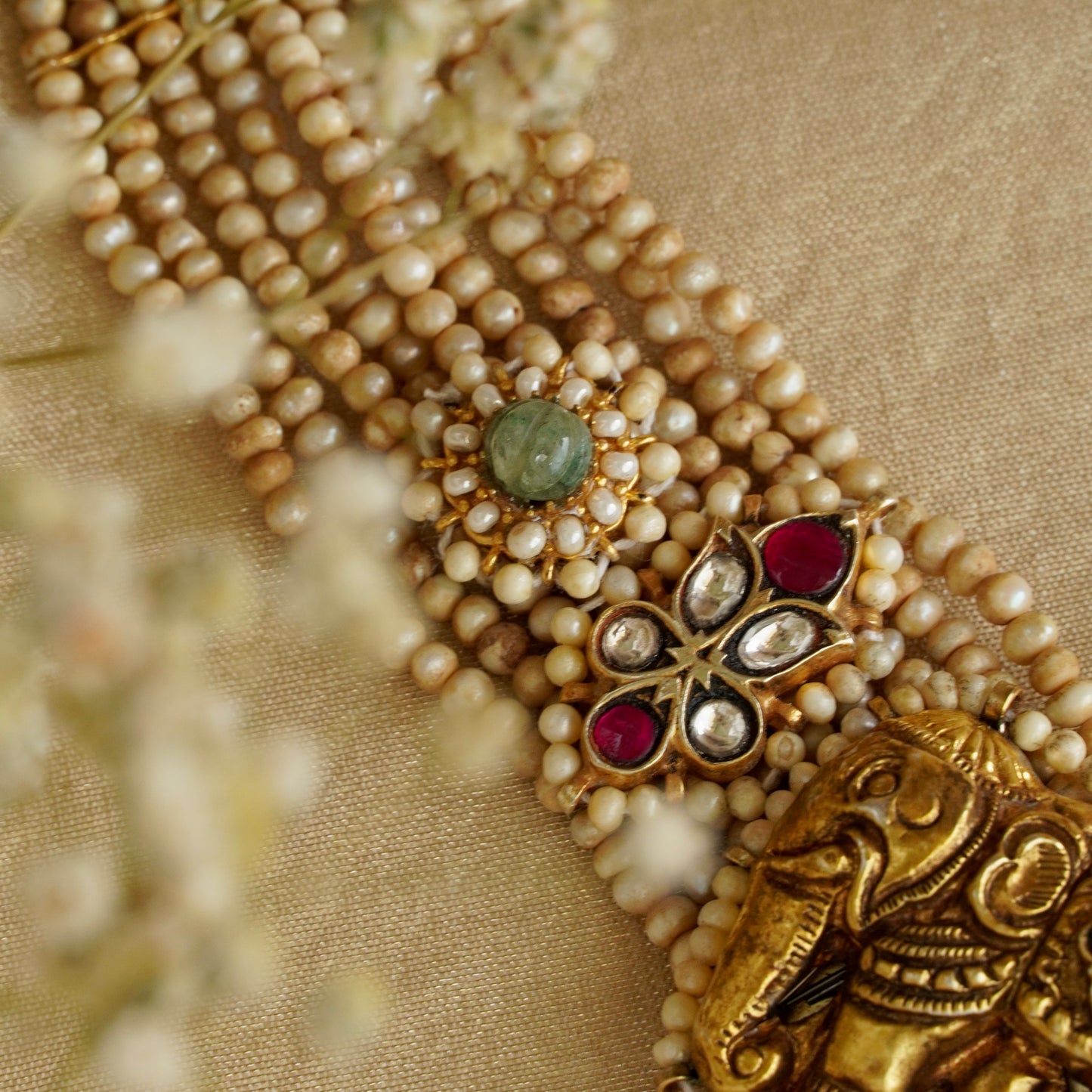 Laxmiji Pendant with Gaj fastened on precious fresh-water pearls
