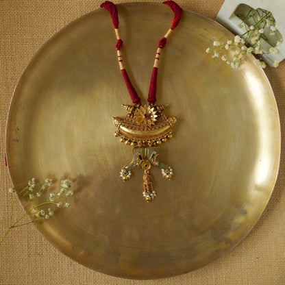 Sun Amulate with green gemstone tusks Pendant