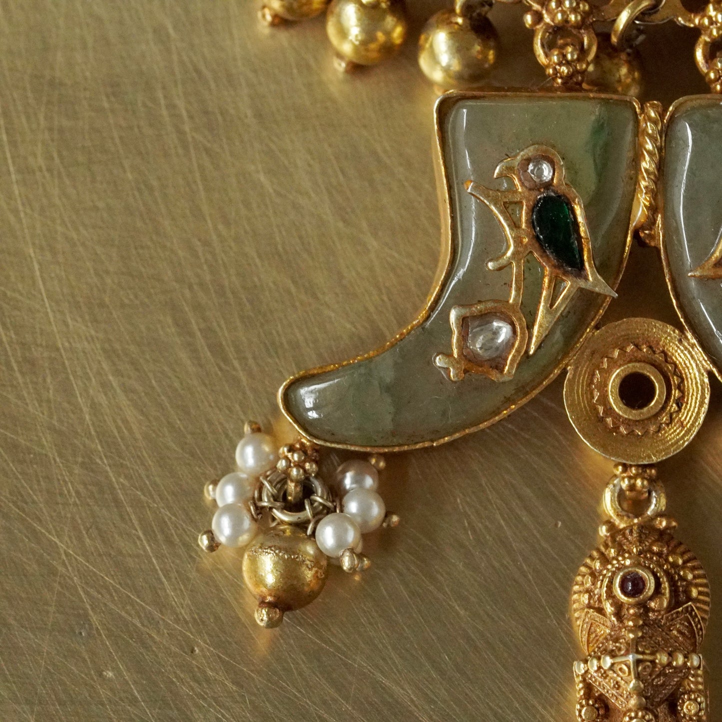 Sun Amulate with green gemstone tusks Pendant