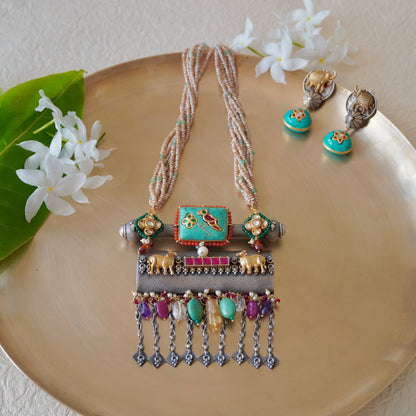 Firoza gemstone on Amulate over a Nagada piece fastened in fresh-water precious pearls and earrings