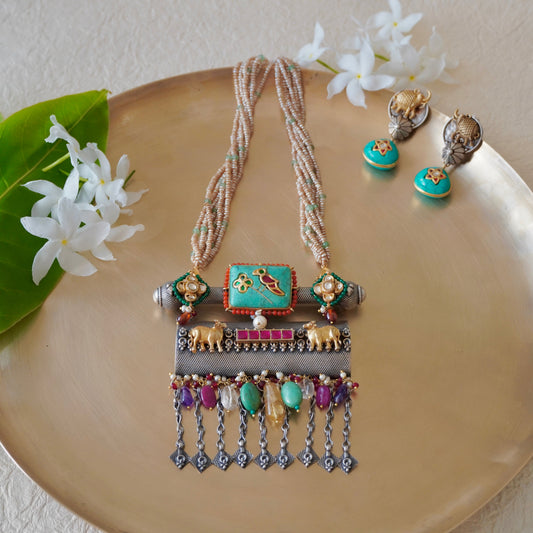 Firoza gemstone on Amulate over a Nagada piece fastened in fresh-water precious pearls and earrings