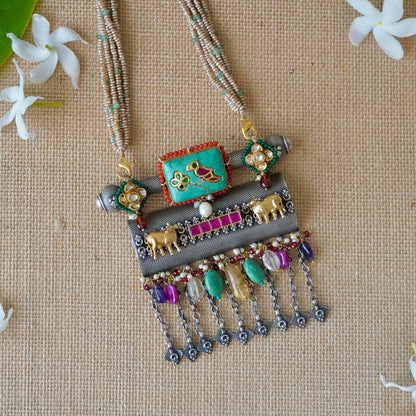 Firoza gemstone on Amulate over a Nagada piece fastened in fresh-water precious pearls and earrings