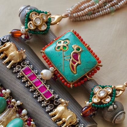 Firoza gemstone on Amulate over a Nagada piece fastened in fresh-water precious pearls and earrings