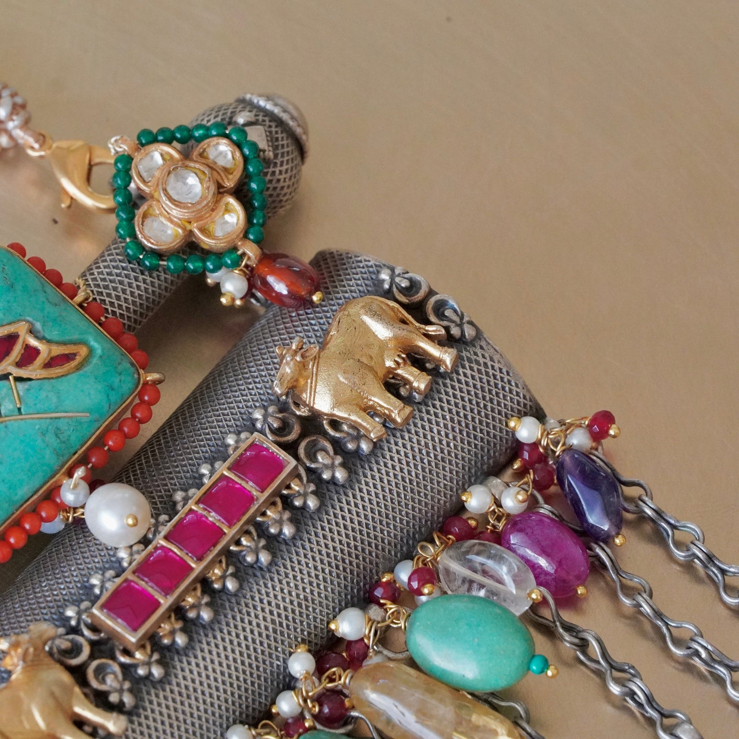 Firoza gemstone on Amulate over a Nagada piece fastened in fresh-water precious pearls and earrings