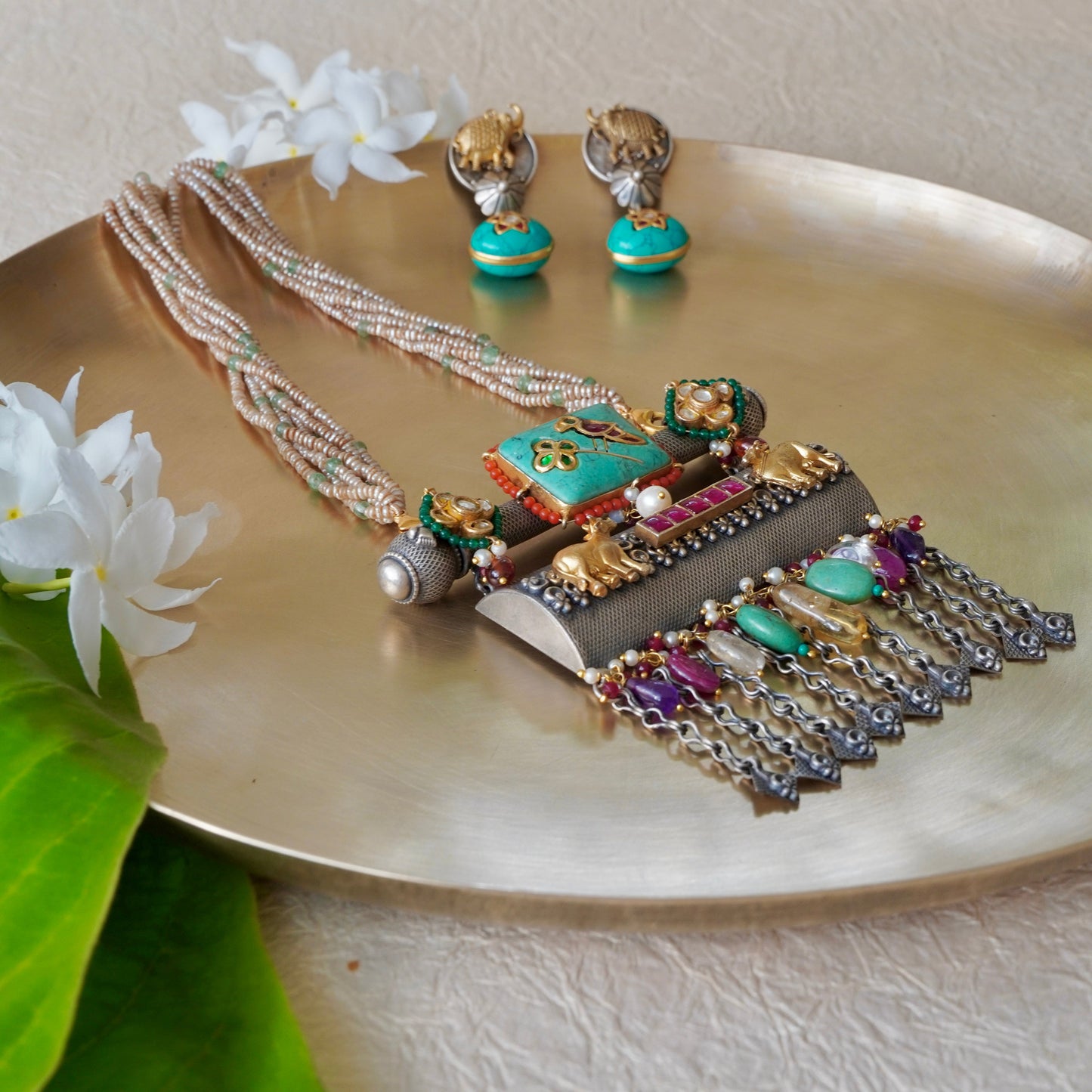 Firoza gemstone on Amulate over a Nagada piece fastened in fresh-water precious pearls and earrings